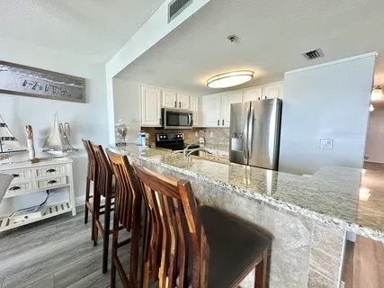 a view of wooden floor with a lake view