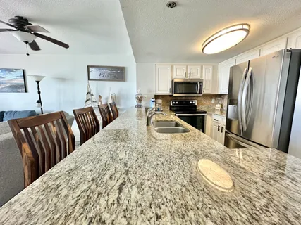a view of a wooden floor and window