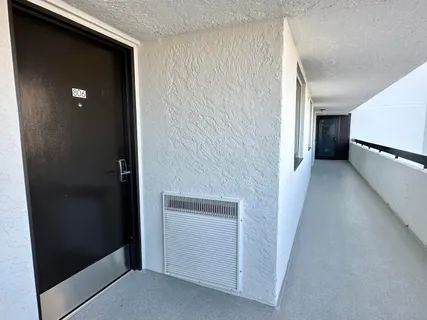 a view of a balcony with an ocean view