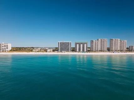 a view of a yard from a balcony