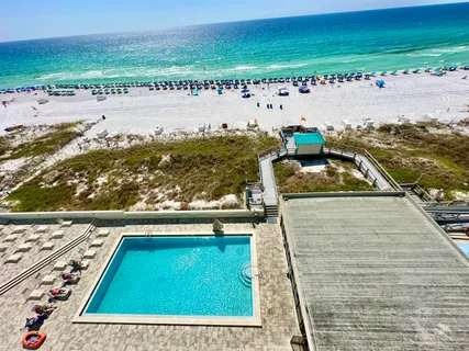 a view of swimming pool with a lake