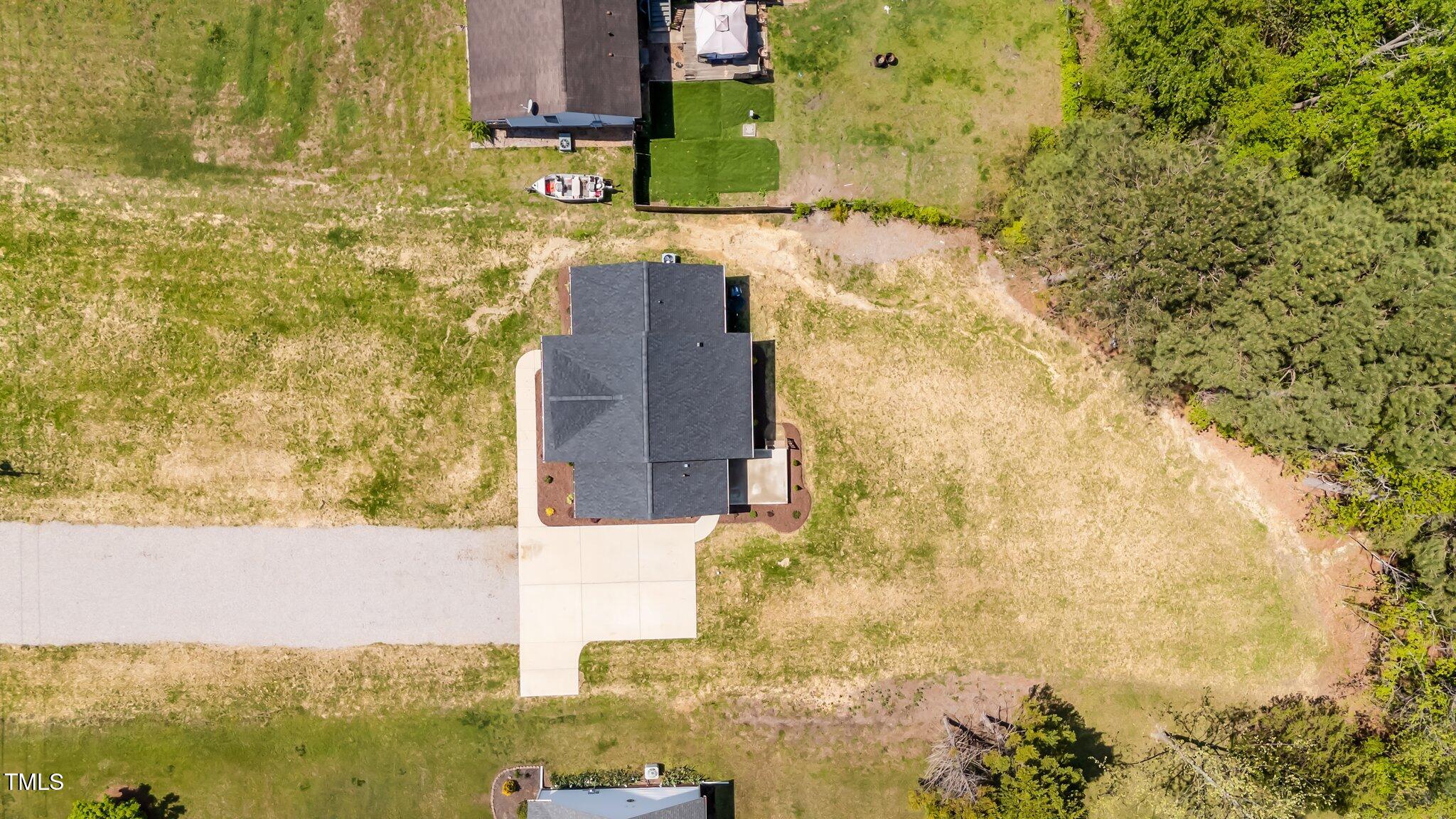 1914 Jack Road Clayton, NC 27520 - Photo 7 of 38 7-web-or-mls-dji_fly_20250414_135812_005