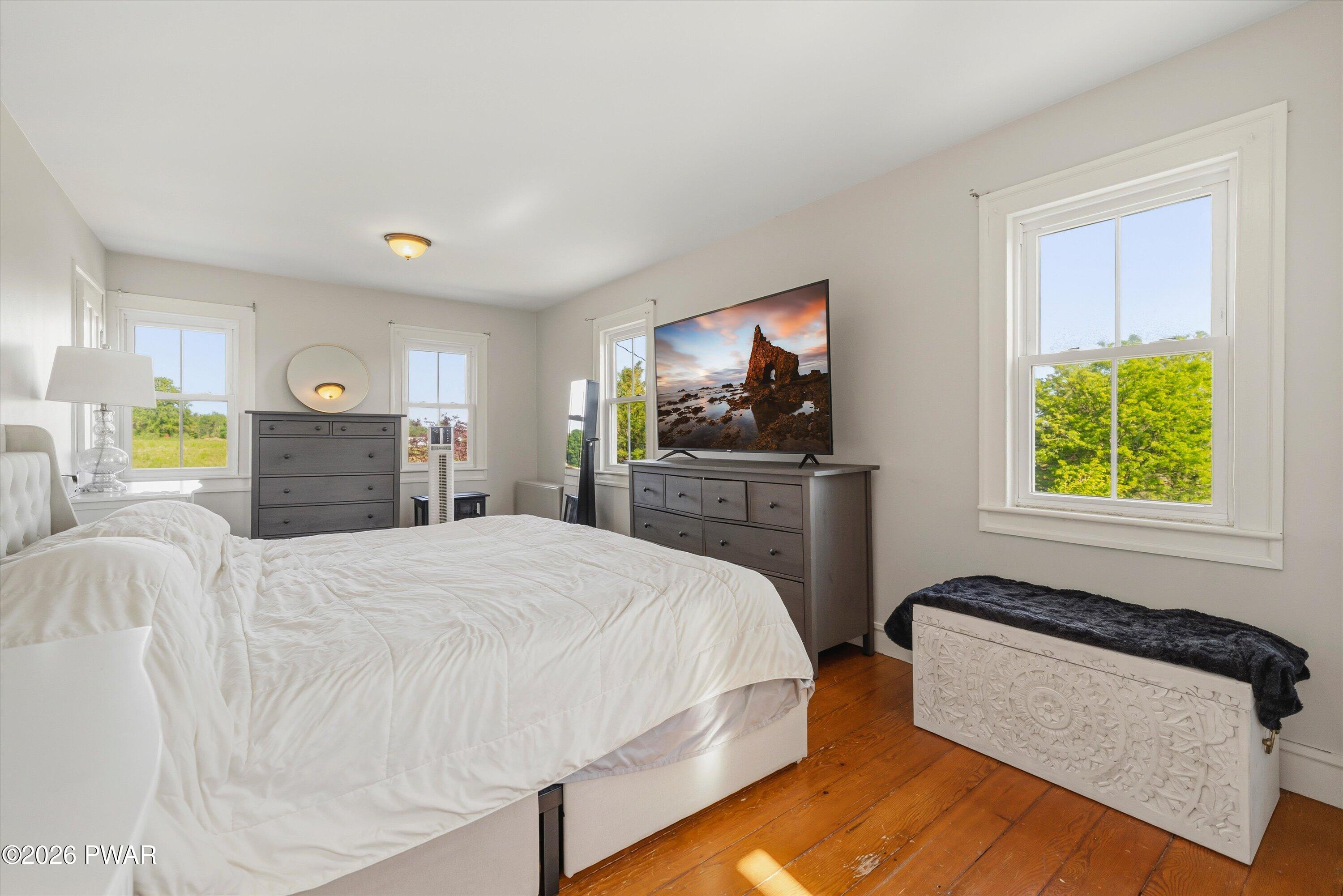 127 Valleyview Road Greentown, PA 18426 - Photo 39 of 66 a bedroom with a bed and a flat screen television