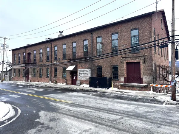 a view of a building with a street