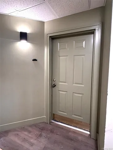 an empty room with closet area