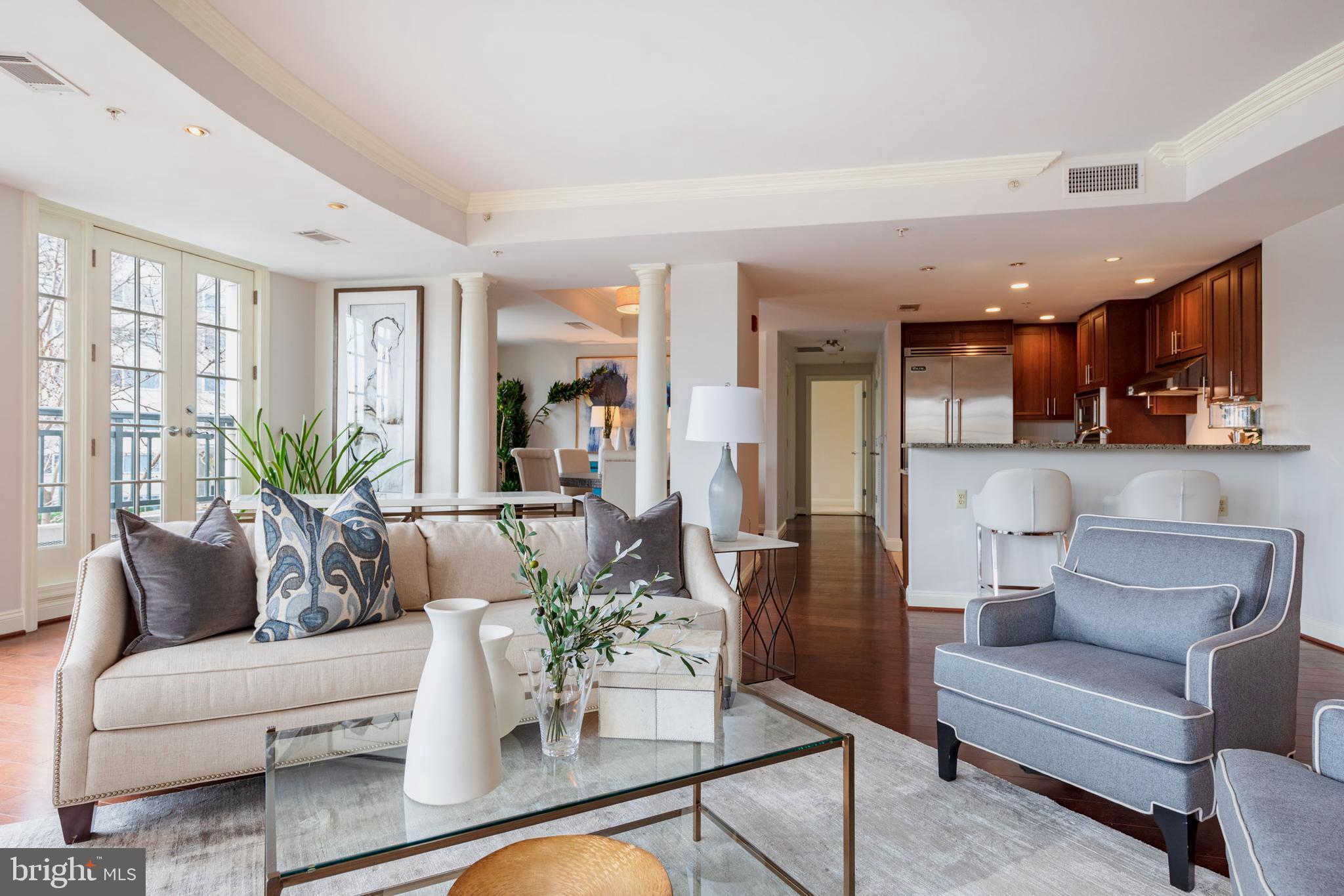 2501 Wisconsin Avenue Northwest, Unit 303 Washington, DC 20007 - Photo 5 of 24 Living room with view to Kitchen and dining room