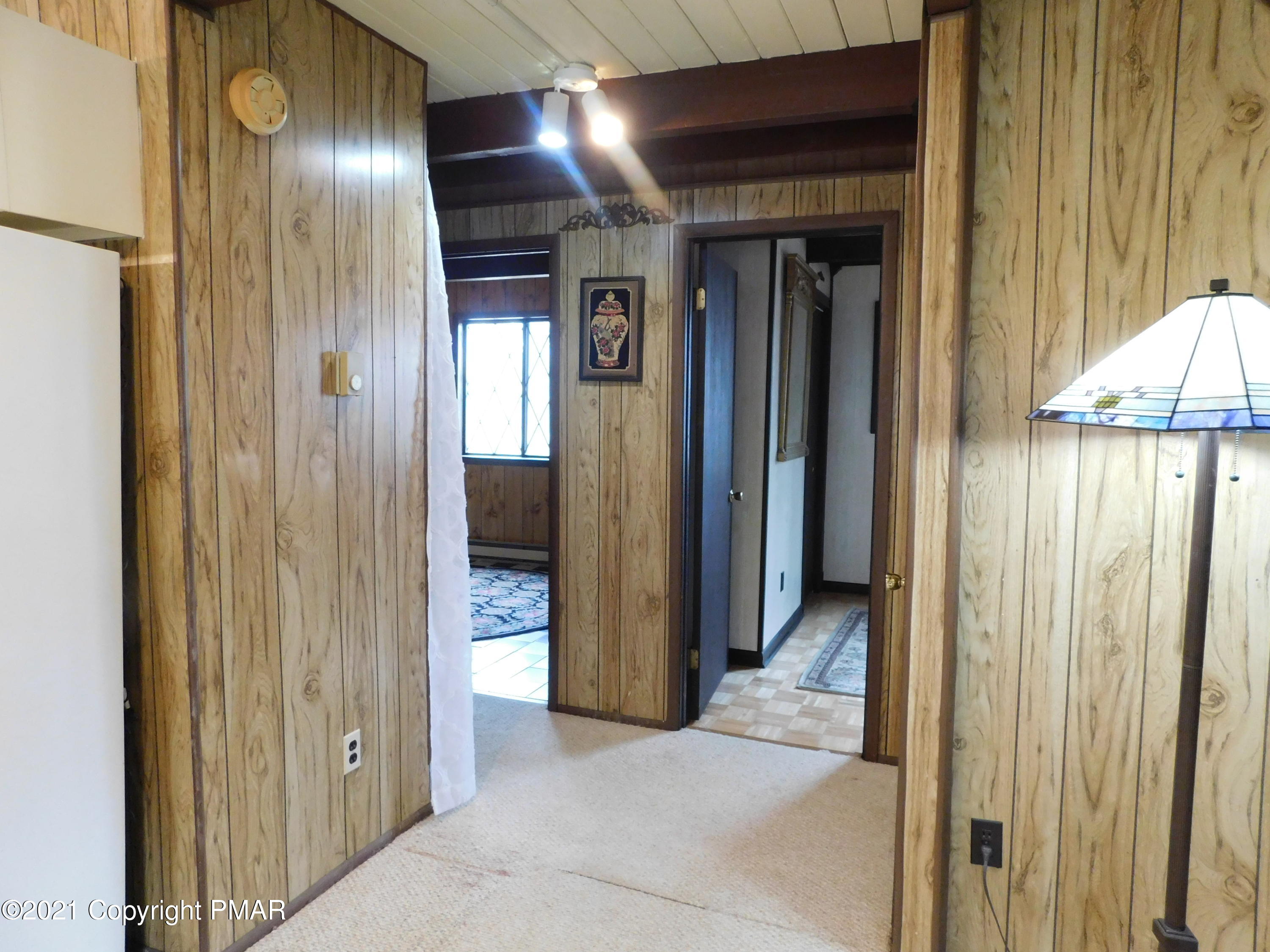 4386 Pine Ridge Drive East Bushkill, PA 18324 - Photo 30 of 36 1st floor hallway