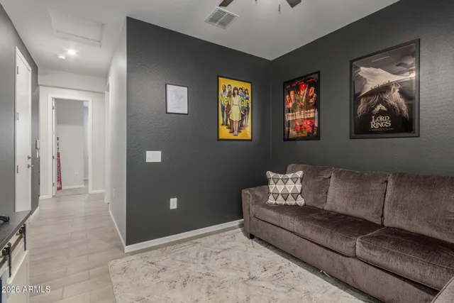 a living room with furniture and window