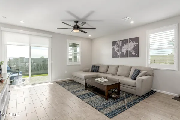 a living room with furniture and a window