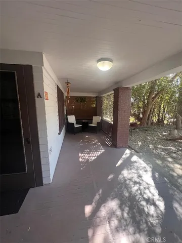 a view of a livingroom with a furniture