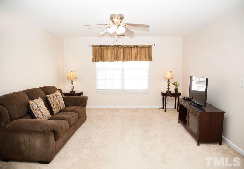 2879 Orchard Trace Way Raleigh, NC 27610 - Photo 15 of 25 Open space for entertaining or children's play room or man cave!