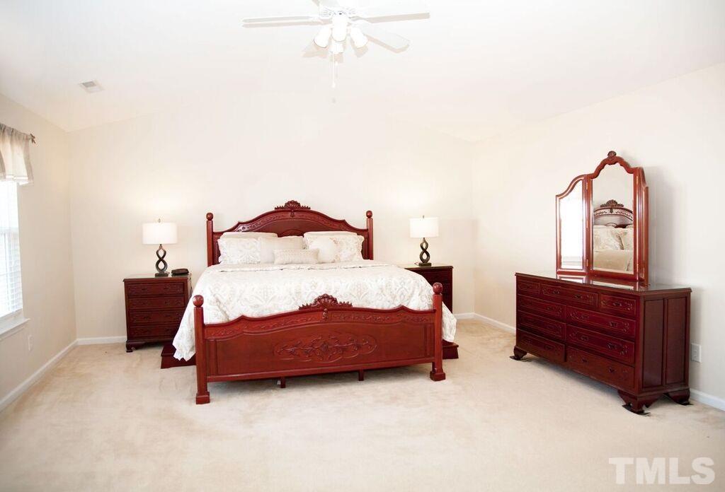 2879 Orchard Trace Way Raleigh, NC 27610 - Photo 22 of 25 Has it's own sitting area! This room is massive!