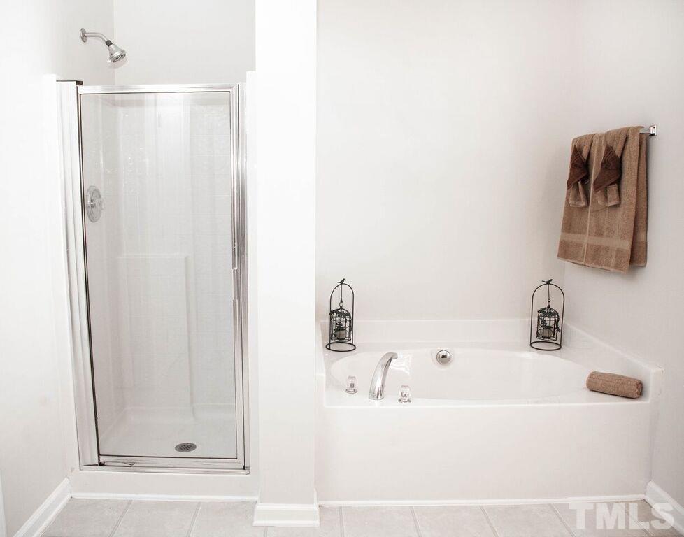 2879 Orchard Trace Way Raleigh, NC 27610 - Photo 23 of 25 Separate shower and oversize tub