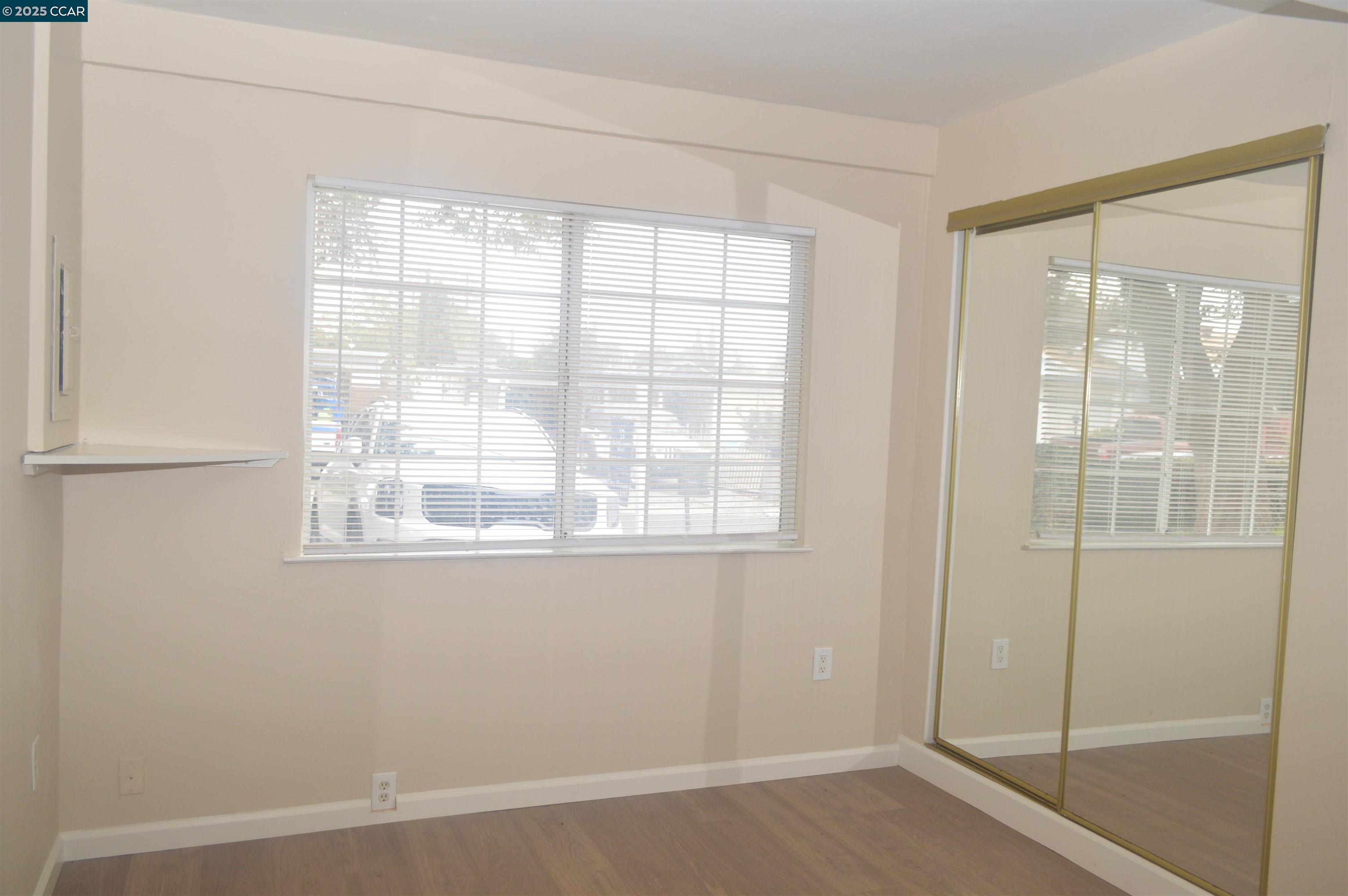 92 Beach Drive Bay Point, CA 94565 - Photo 8 of 19 a view of an empty room with a window