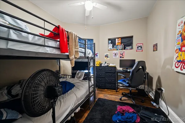 a view of a hallway to a livingroom and furniture