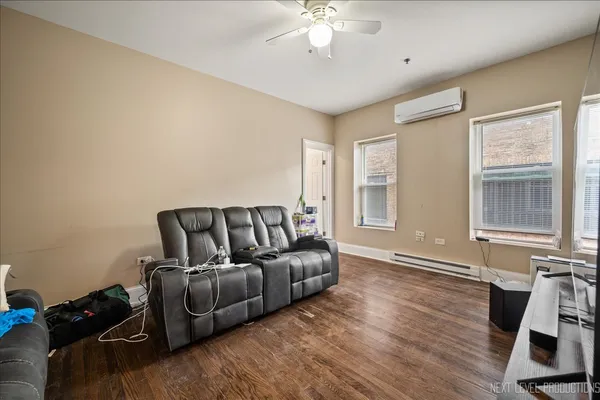 a living room with furniture and a window