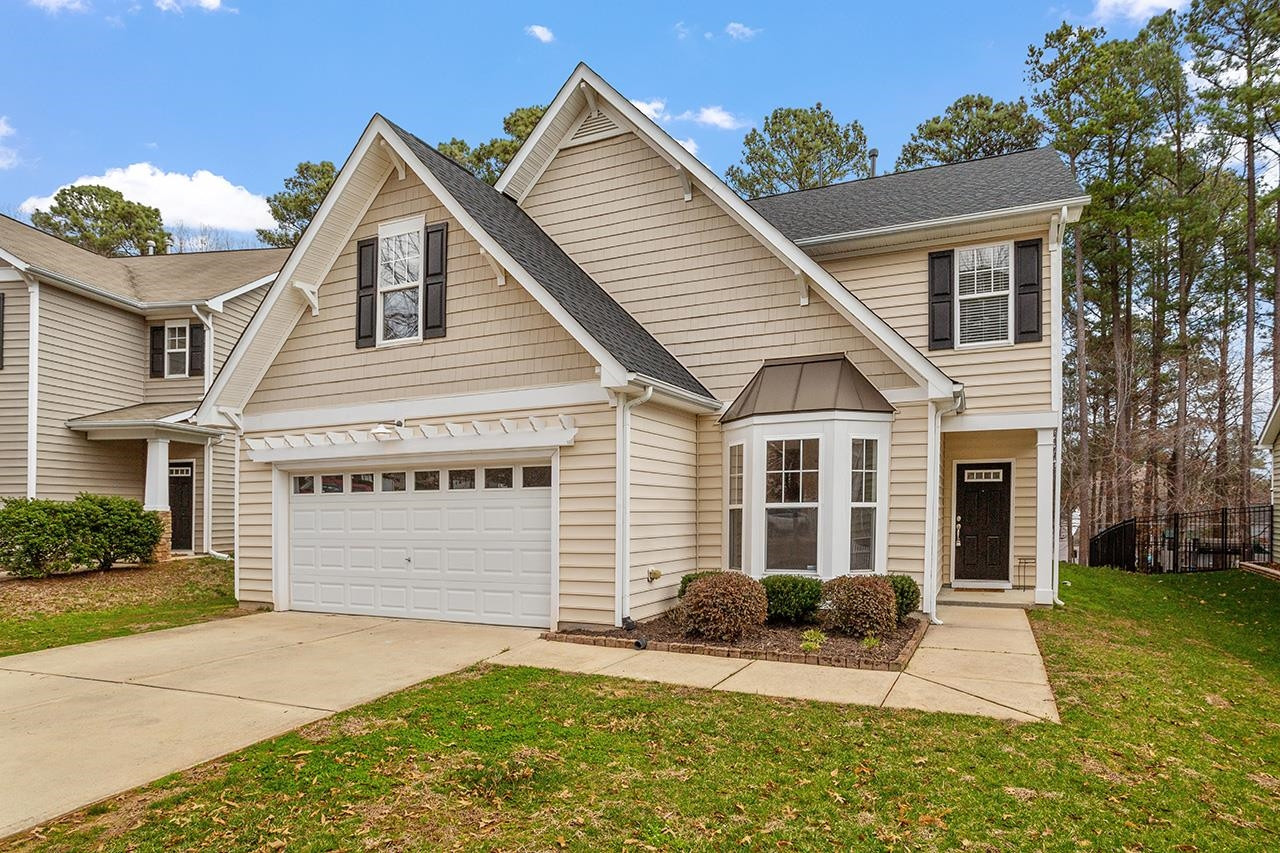 3317 Silver Star Drive Durham, NC 27713 - Photo 2 of 25 a front view of a house with a yard