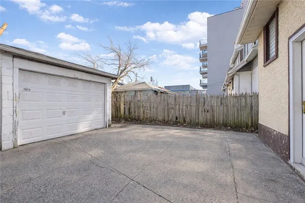 a view of a backyard of the house