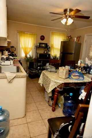 a kitchen with a sink appliances and cabinets