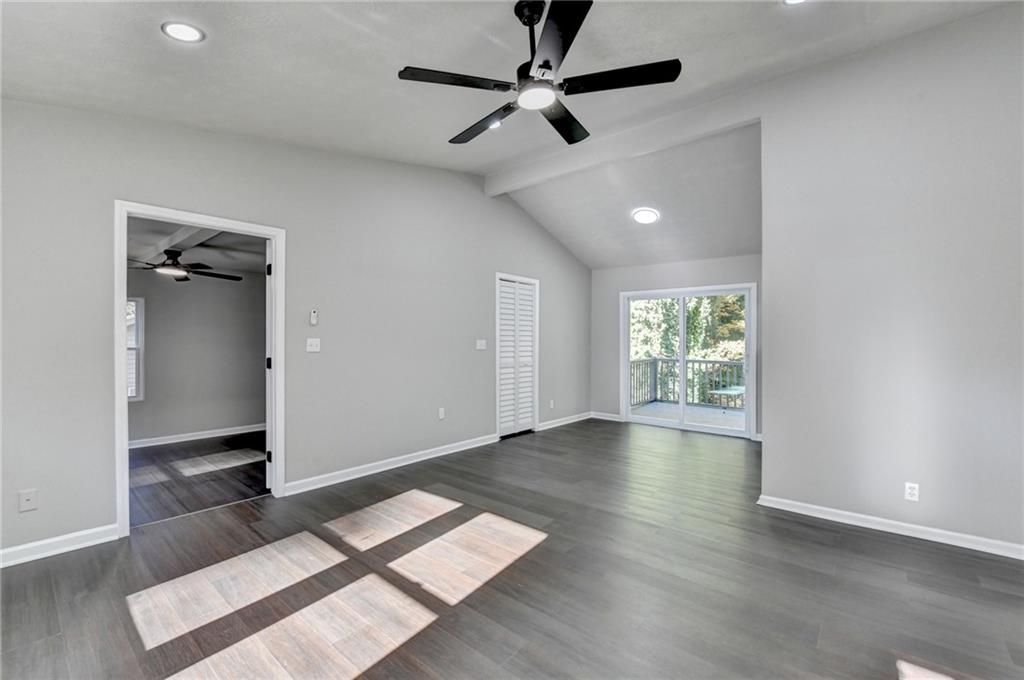 2853 Franklin Road Southwest Lawrenceville, GA 30044 - Photo 11 of 40 wooden floor in an empty room with a window