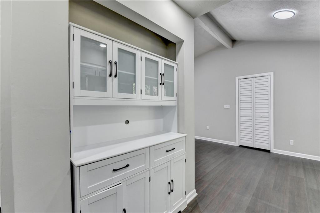 2853 Franklin Road Southwest Lawrenceville, GA 30044 - Photo 17 of 40 a view of cabinets and wooden floor