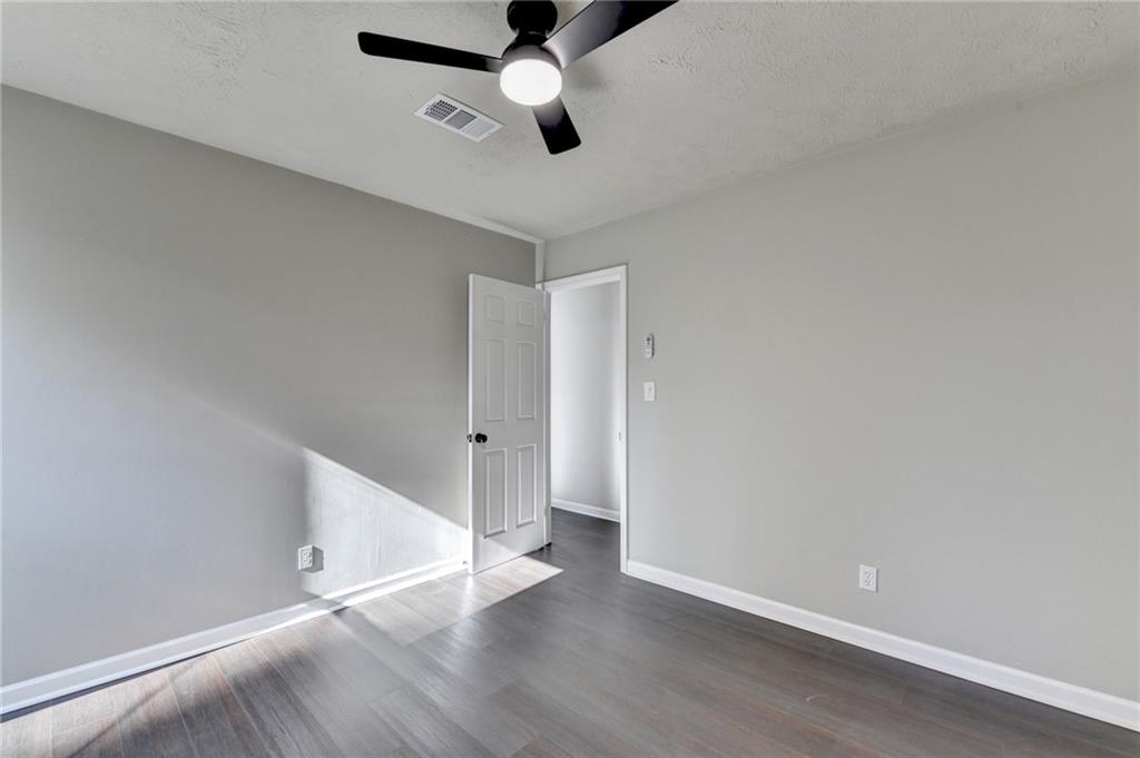2853 Franklin Road Southwest Lawrenceville, GA 30044 - Photo 25 of 40 wooden floor in an empty room