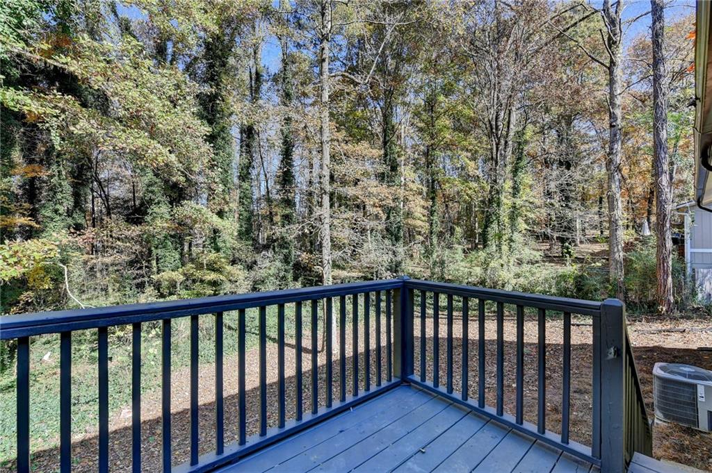 2853 Franklin Road Southwest Lawrenceville, GA 30044 - Photo 34 of 40 a view of balcony with wooden floor