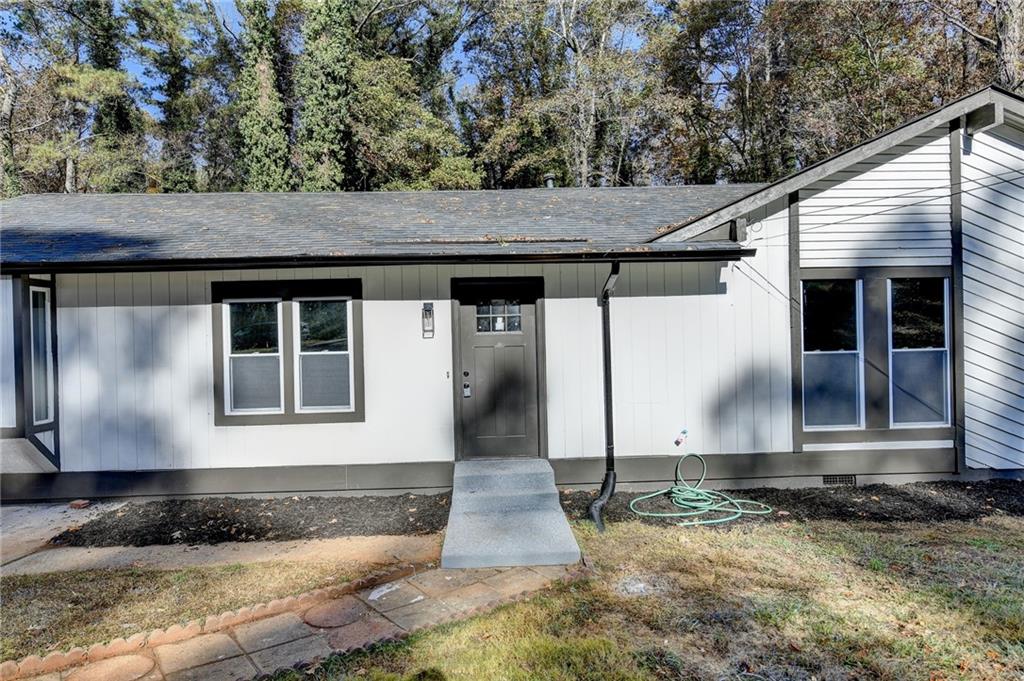 2853 Franklin Road Southwest Lawrenceville, GA 30044 - Photo 5 of 40 a view of a house with a yard