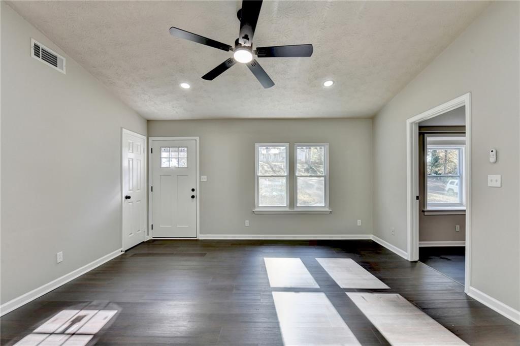 2853 Franklin Road Southwest Lawrenceville, GA 30044 - Photo 7 of 40 a view of an empty room with a window