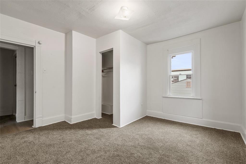 405 Main Street Coraopolis, PA 15108 - Photo 16 of 24 a view of an empty room with a window