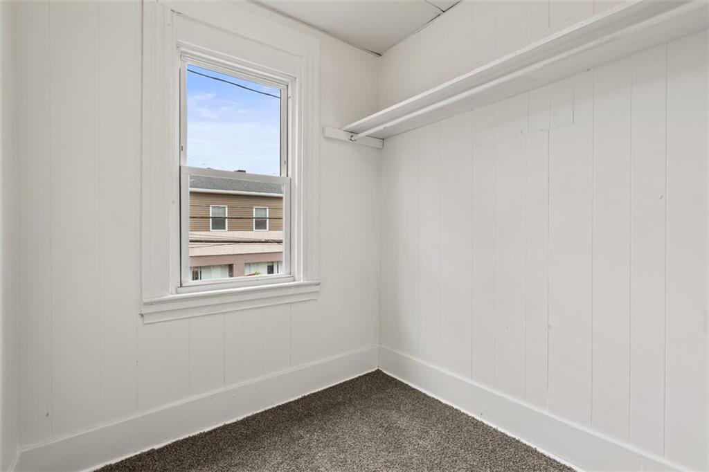 405 Main Street Coraopolis, PA 15108 - Photo 17 of 24 wooden floor in an empty room with a window