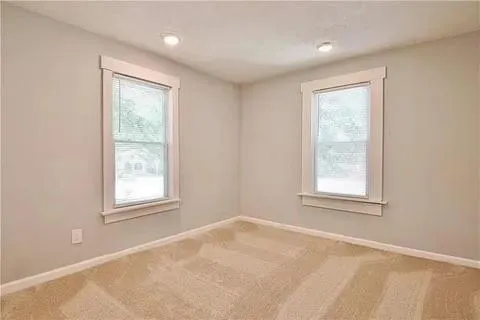 a view of a wooden roof deck