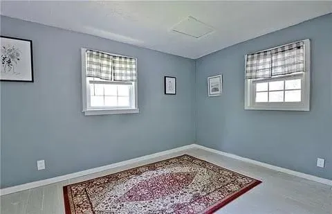 a room with furniture and a window
