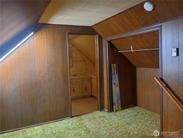 a view of hallway with closet