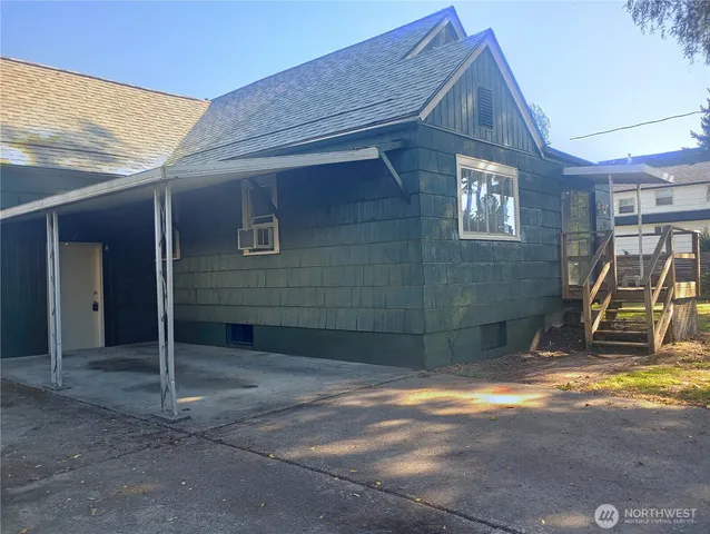 a view of outdoor space and front view of a house