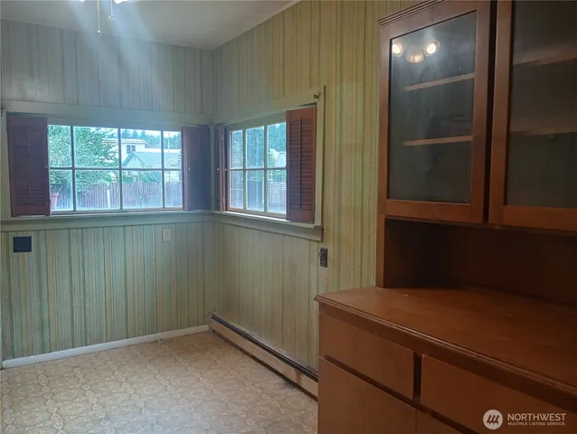 a view of entryway with a front door