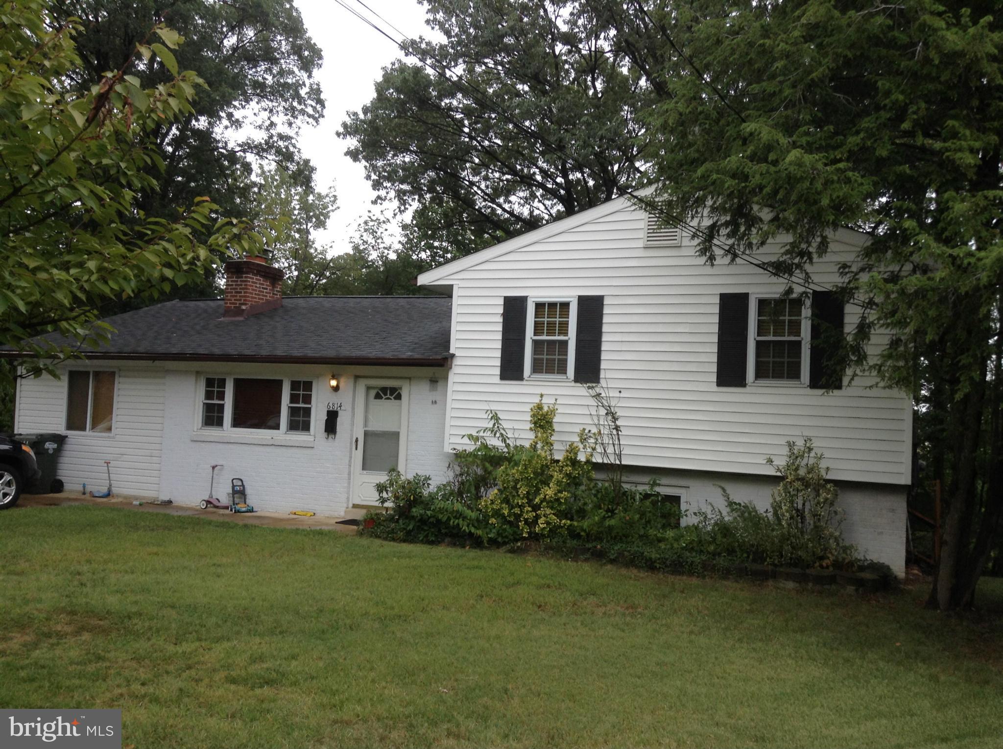 6814 Mayo Court Springfield, VA 22150 - Photo 1 of 30 a front view of house with yard and trees