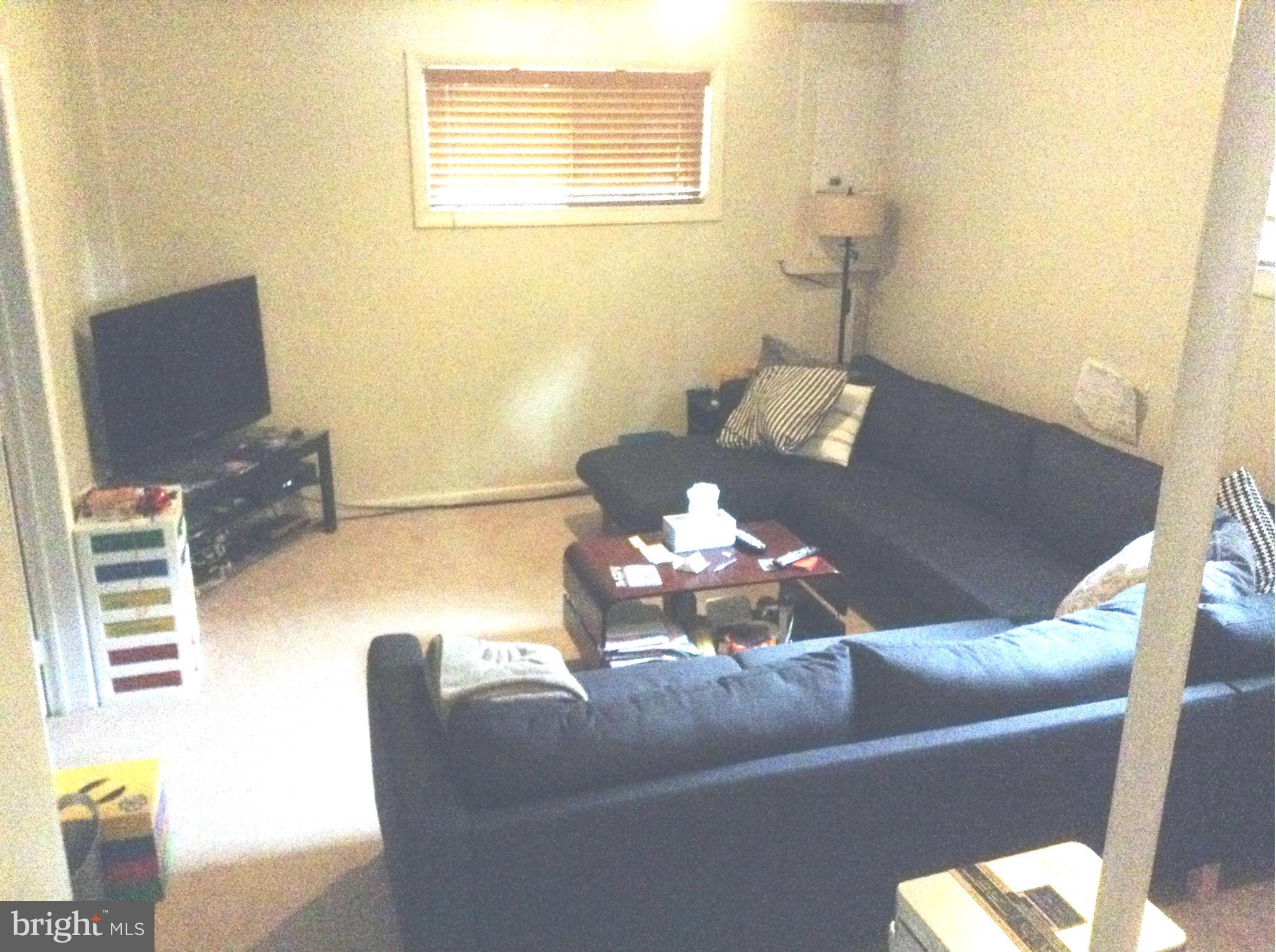 6814 Mayo Court Springfield, VA 22150 - Photo 2 of 30 a living room with furniture and wooden floor