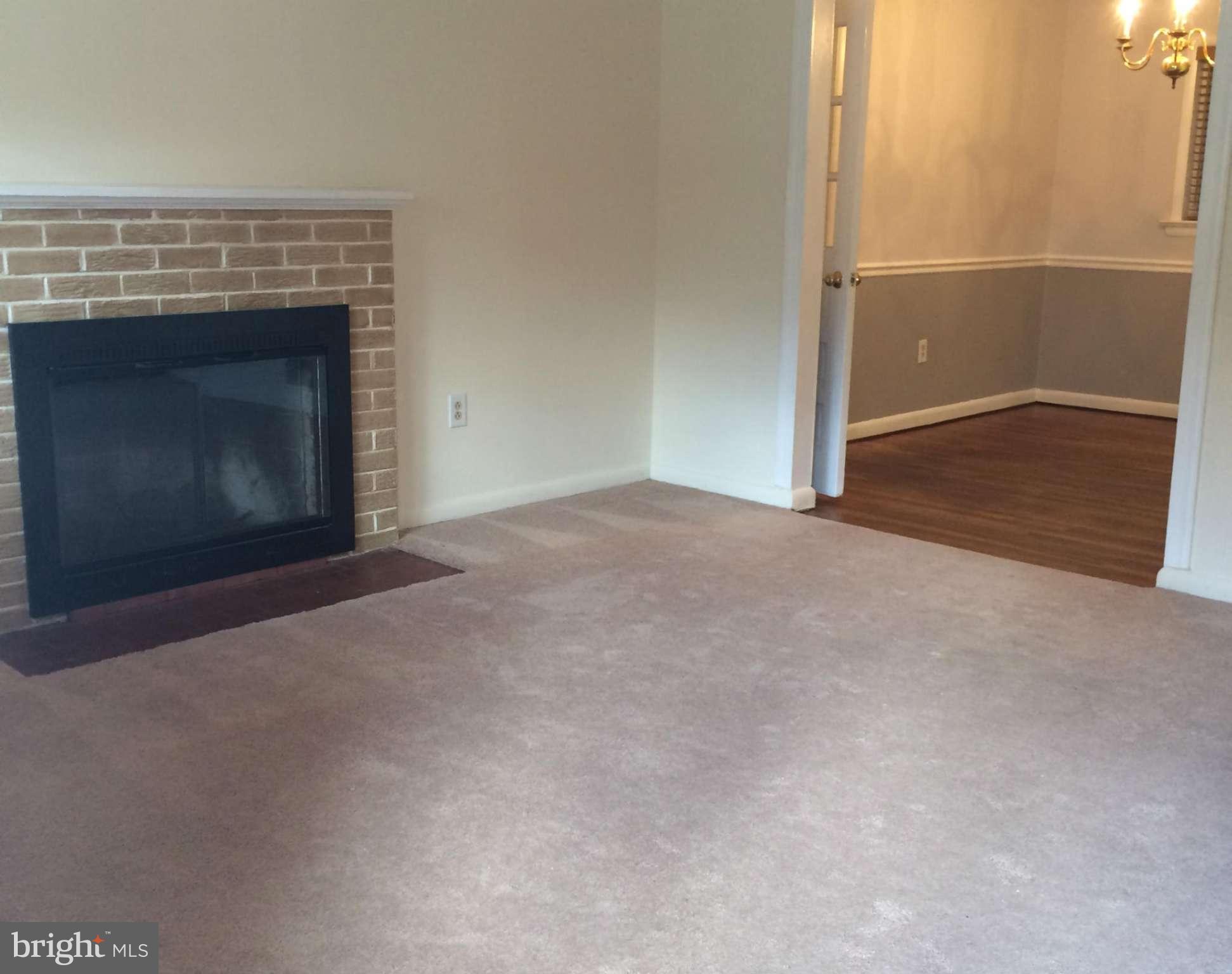 6814 Mayo Court Springfield, VA 22150 - Photo 14 of 30 a view of empty room with window and fireplace