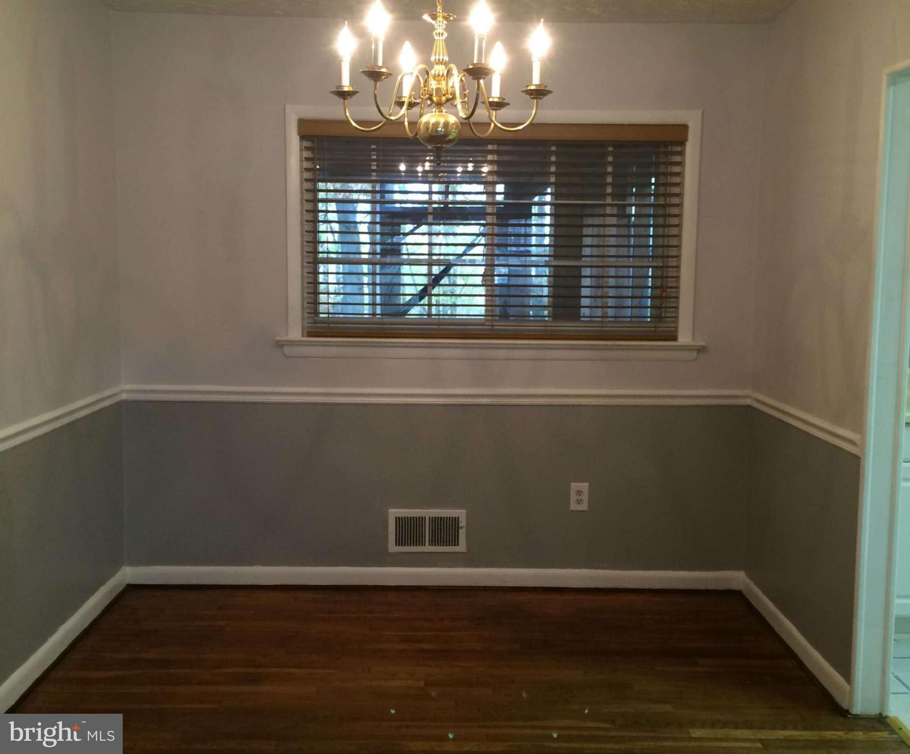 6814 Mayo Court Springfield, VA 22150 - Photo 15 of 30 a view of empty room with wooden floor and fan