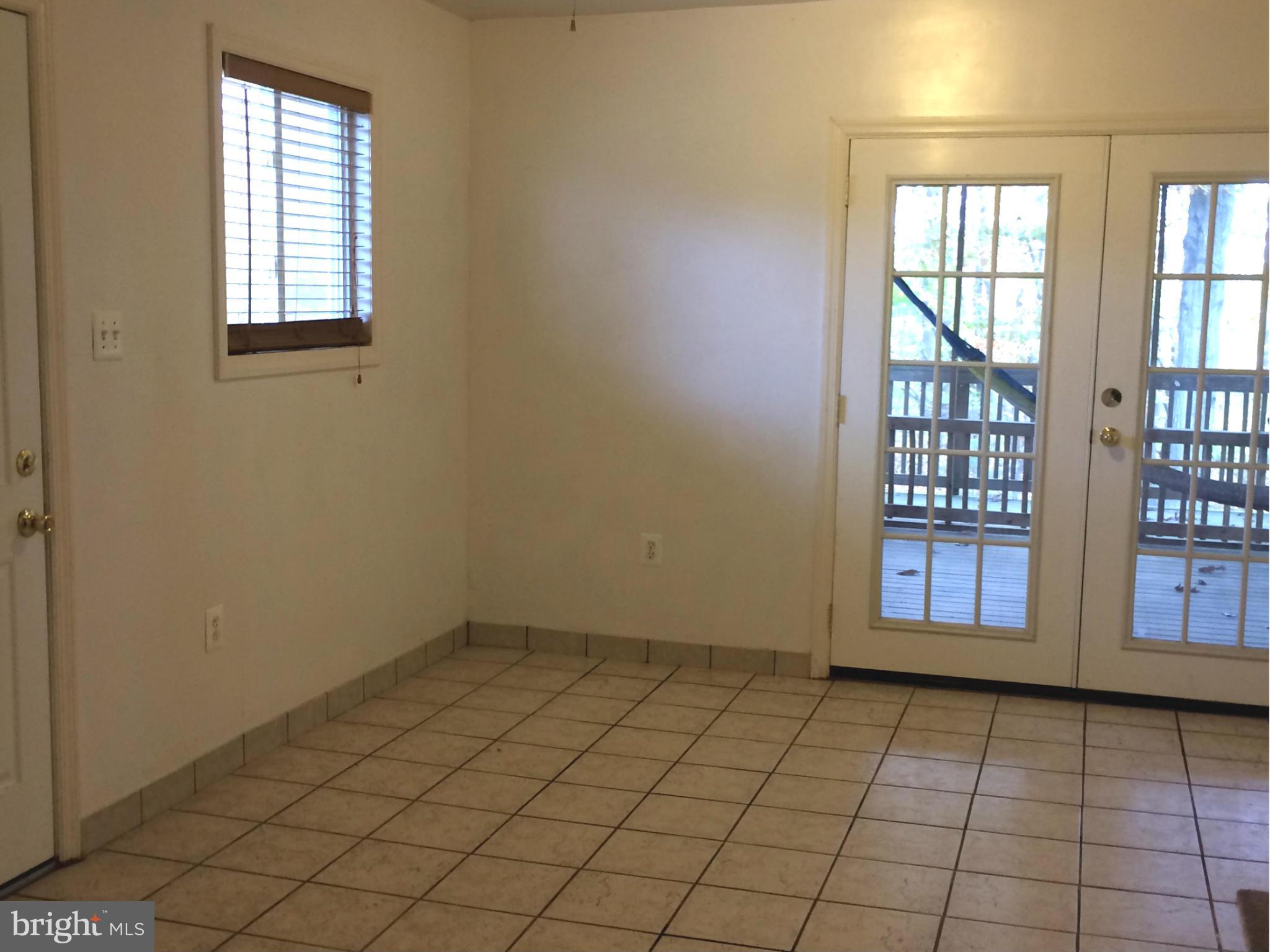6814 Mayo Court Springfield, VA 22150 - Photo 20 of 30 an empty room with windows