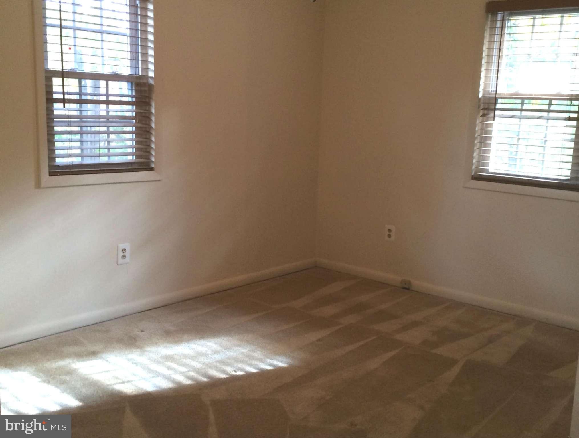 6814 Mayo Court Springfield, VA 22150 - Photo 27 of 30 an empty room with a window