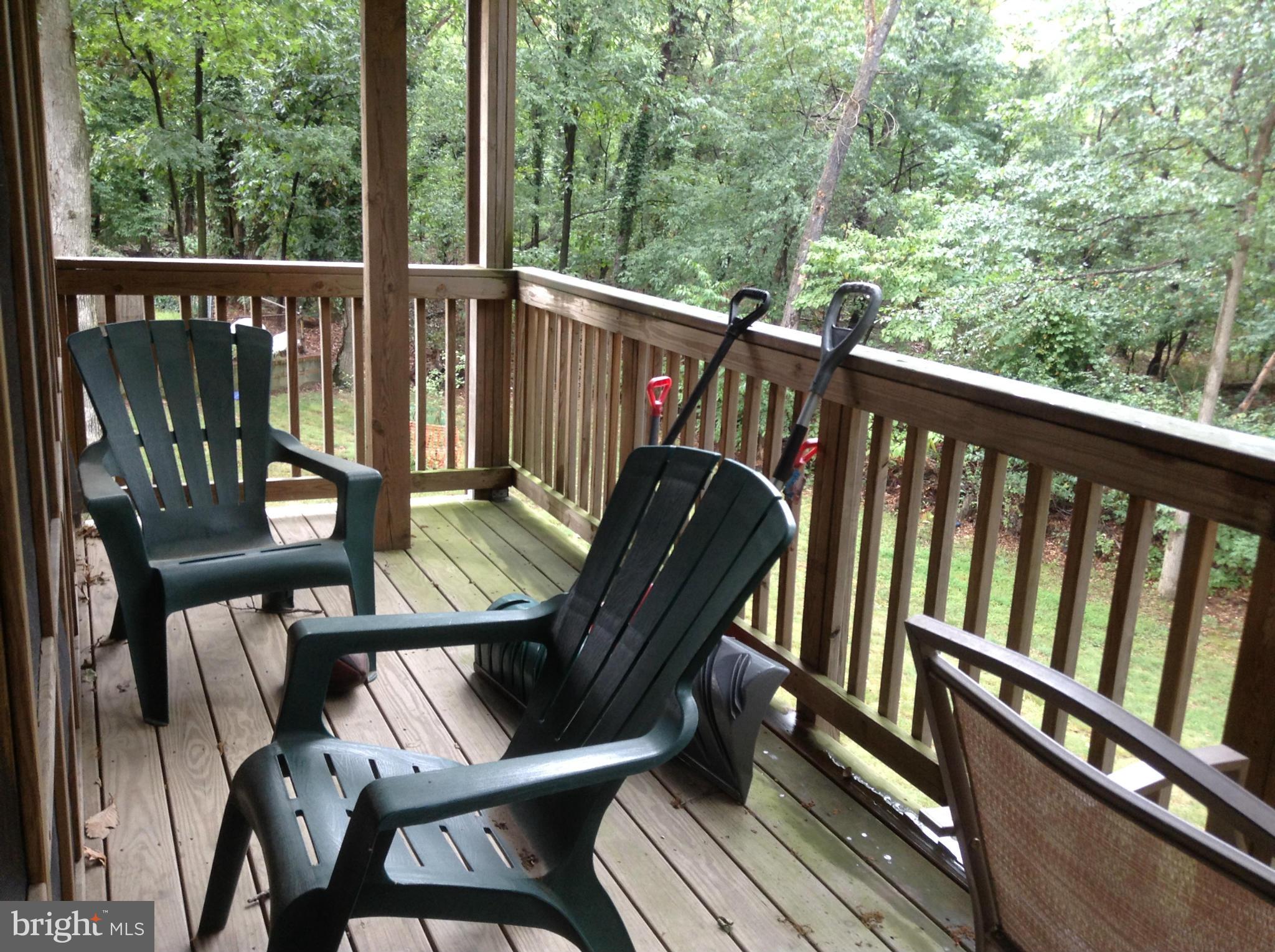 6814 Mayo Court Springfield, VA 22150 - Photo 7 of 30 a view of a two chairs in the balcony