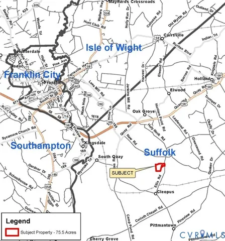 a white house with a tree in the background