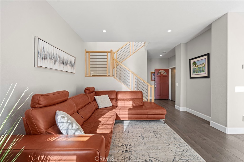 33 Gauguin Circle Aliso Viejo, CA 92656 - Photo 14 of 49 a living room with furniture and a rug