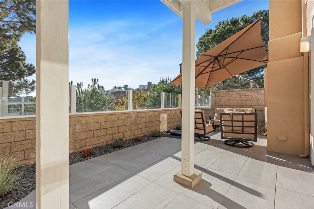 33 Gauguin Circle Aliso Viejo, CA 92656 - Photo 16 of 49 a view of a bench in the porch