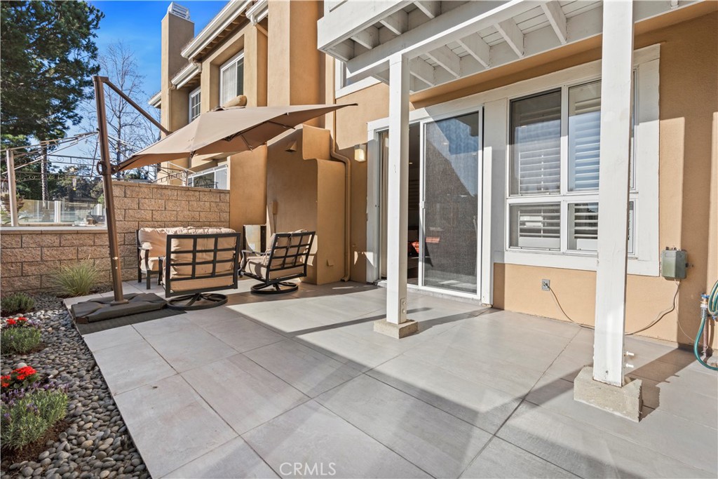 33 Gauguin Circle Aliso Viejo, CA 92656 - Photo 17 of 49 a backyard of a house with seating space