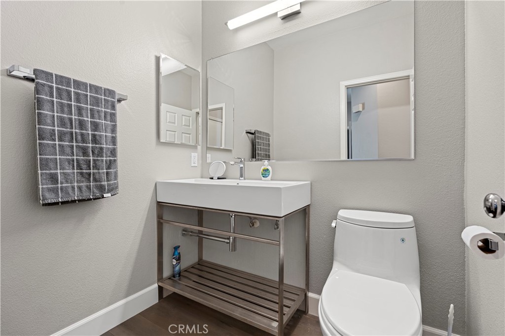 33 Gauguin Circle Aliso Viejo, CA 92656 - Photo 20 of 49 a bathroom with a sink toilet and mirror