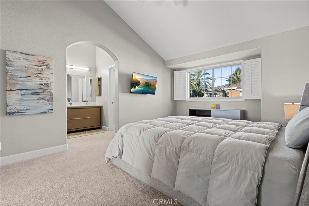 33 Gauguin Circle Aliso Viejo, CA 92656 - Photo 27 of 49 a bedroom with a bed and window