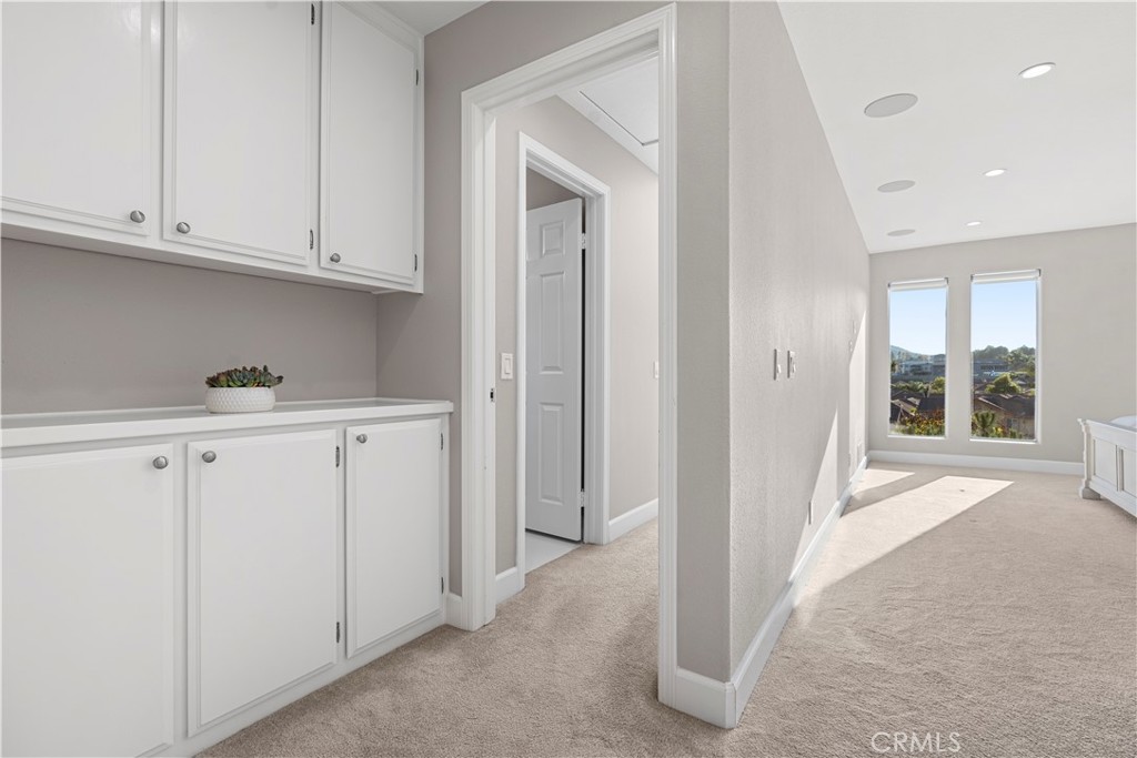 33 Gauguin Circle Aliso Viejo, CA 92656 - Photo 32 of 49 a view of a hallway with closet area